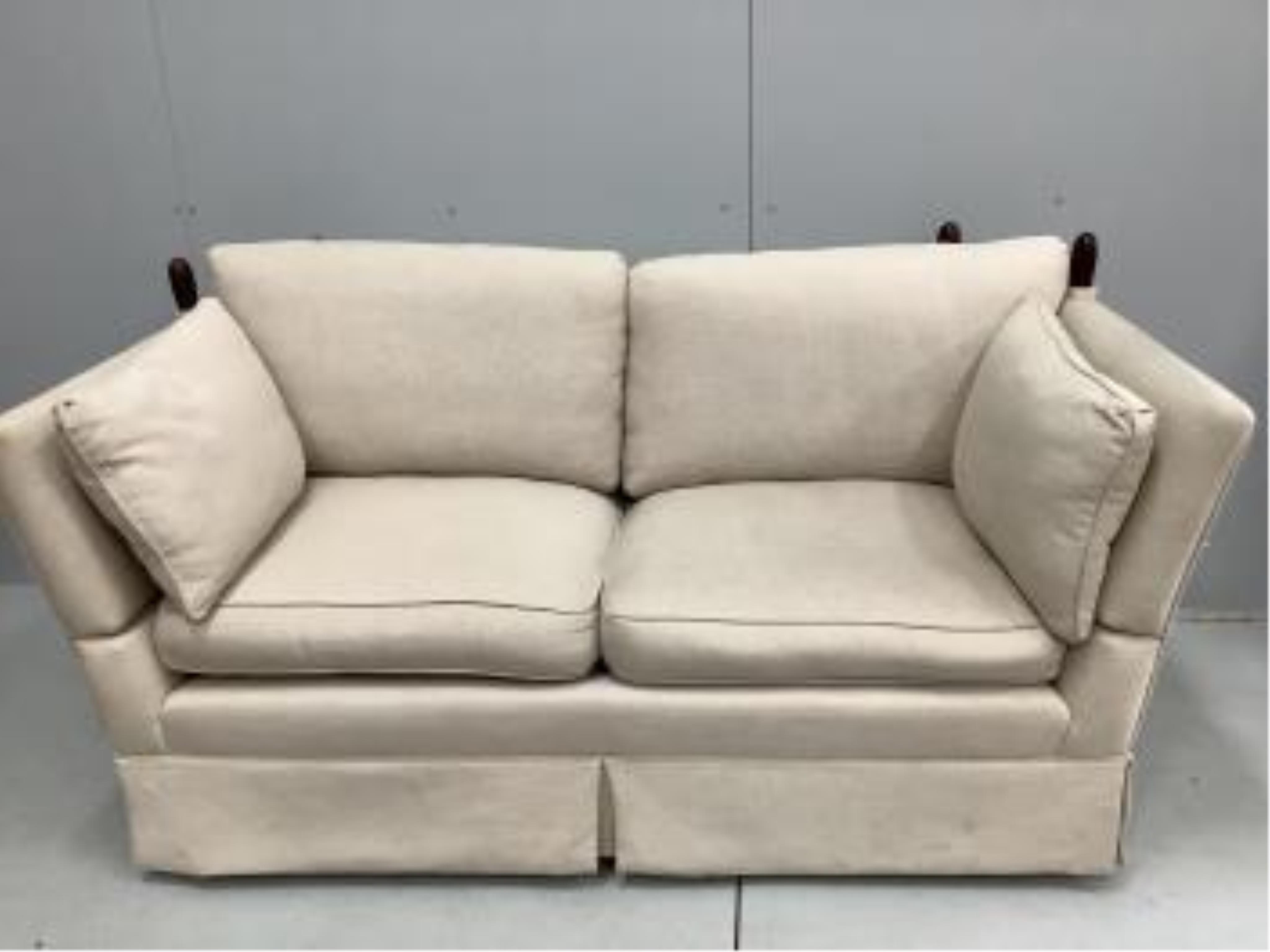 A small Contemporary Knowle settee upholstered in a natural linen fabric, width 170cm, depth 84cm, height 85cm. Condition - good